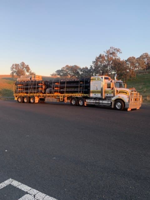 Large pipes loaded for infrastructure projects